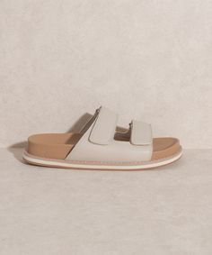 A classic sandal redesigned for better comfort and softer wear Man made Upper Insole . Rubbed heel with 1" platform. Bottom of the sole: 5.25" Classic Textured Open Toe Slides, Comfortable Open Toe Platform Slides, Beige Platform Slippers With Textured Footbed, Open Toe Footbed Sandals For Everyday Spring Wear, Casual Platform Slide Slippers With Leather Footbed, Classic Slip-on Footbed Sandals For Summer, Comfortable Open Toe Platform Slippers With Textured Sole, Classic Open Toe Slides With Textured Sole, Classic Everyday Slip-on Sandals