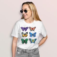 This butterfly shirt has a colorful retro and vintage inspired graphic of butterflies, giving the tshirt a cool aesthetic. This graphic tee is made of exceptionally soft, lightweight fabric and has a modern UNISEX fit. Makes a great gift for her! Check out the heather colors that have a bit of added polyester for some extra drape.- Relaxed, loose UNISEX fit. Women should size down if you like a slimmer fit.- Runs true to size.- 100% of the HIGHEST QUALITY combed and ring-spun cotton with ECO-FRI Cool Aesthetic, Butterfly Shirt, Women Aesthetic, Aesthetic Shirt, Butterfly Shirts, Women's Muscle, Aesthetic Shirts, Tees For Women, Unisex Shorts