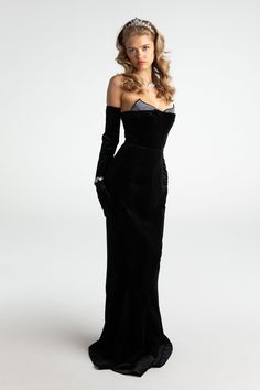 Romance is in the air this season, and it has everything to do with the Juliana Velvet Dress. Look and feel lavish for extravagant events in this dreamy, strapless design that fits you like a glove. It features a hot drill detail and fishtail skirt to give the sexy dress some unique style. Wear it for a date night or evening under the stars. Velvet fabric Fishbone clasp Fishtail skirt Hot drill design Dry clean only Velvet Gowns, Look Gatsby, Fishtail Skirt, Maxi Gown Dress, Rhinestone Trim, Find You, Crop Blouse, Velvet Dress, Velvet Fabric