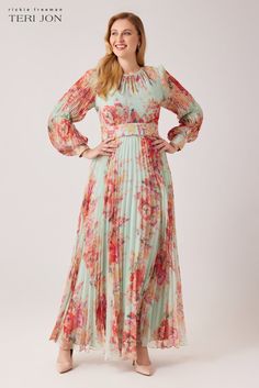 Step into sophistication with this printed chiffon maxi gown! This enhancing ensemble entails a mesmerizing mint colorway, an alluring jewel pleated neckline, defined waist, and a gracefully flowy skirt. Wear this stunning piece to a destination wedding or formal spring affair. Pair with gold accessories to complete the look. Jewel Neckline Long Sleeves Pleated Skirt Floor Length Wear to destination weddings, cocktail parties, and semi-formal events ¬† Pleated Gown, Black Tie Party, Ruched Maxi Dress, Teri Jon, Maxi Gown, Pleated Bodice, Floor Length Gown, Chiffon Gown, Pleated Maxi