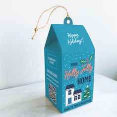 a blue box with a christmas design on the front that says, your holly jolly home