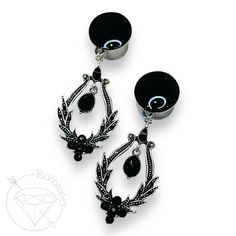 "✨ PLEASE READ BEFORE PURCHASING ✨ Pair of black rhinestone crystal dangle plugs. Steel and black toned blank* secured to single-flare 316L surgical stainless steel plugs.  Please: Read Boholobe's shop policies and the info in the MORE section before purchasing, and contact me via Etsy messaging before opening any disputes-Thanks so much! Check out https://www.etsy.com/shop/boholobes for more listings like this one! Embellishment depends on size of tunnels.  Shown on size 9/16\" (14mm) tunnels D Black Internally Threaded Round Piercings, Black Internally Threaded Piercings, Black Internally Threaded Metal Cartilage Earrings, Black Internally Threaded Belly Ring, Black Metal Dangle Body Jewelry, Gothic Black Dangle Body Jewelry, Nickel-free Black Metal Plug Earrings, Adjustable Black Metal Cartilage Earrings, Adjustable Black Metal Piercings