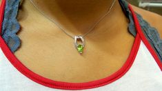 9 mm by 7 mm genuine peridot. pair shaped slide necklace . it is the august birthstone. and it perfect for bridal party gifts it matches with soo many dress colors. and awesome to ware long after . METAL: 925 SILVER STONES: GENUINE PERIDOT STYLE: SLIDE NECKLACE PURITY: 925 STERLING SIZE: 18 MM TOP TO BOTTOM AS IT IS WITH THIS ITEM ALL MY PIECES ARE HAND MADE. AND I STAND BEHIND EVERY PIECE. SATISFACTION GUARANTEED. FIND OUT ABOUT OUR LAYAWAY PAYMENT PLAN AND HASSLE FREE RETURNS IF THERE IS ANY A Fine Jewelry Lime Green Birthstone, Lime Green Birthstone Jewelry For Anniversary, Anniversary Lime Green Birthstone Jewelry, Fine Jewelry Peridot Necklace For Anniversary, Teardrop Peridot Jewelry For May Birthstone, Teardrop Peridot Birthstone Jewelry, Teardrop Peridot Jewelry For Anniversary, Anniversary Peridot Jewelry In White Gold, Anniversary Peridot Birthstone Necklace