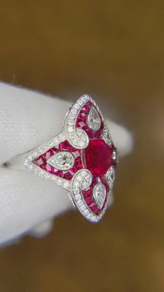 Luxury Red Diamond Ring With Gemstone, Luxury Red Gemstone Diamond Ring, Gia Certified Red Diamond Ring For Formal Occasions, Luxury Gia Certified Cushion Cut Ruby Ring, Luxury Red Ruby Ring With Vvs Clarity, Luxury Cushion Cut Ruby Ring With Diamond, Luxury Red Gia Certified Rings, Classic Red Diamond Ring For Formal Occasions, Luxury Red Marquise Cut Jewelry