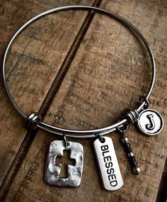 "Stainless steel adjustable Blessed bracelet can be made with a Hammered Rectangle charm or Circle Cut Out charm and your choice of a letter initial charm. These come in either 2.6\" large, 2.4\" average, or 2.0\" (child size). Stainless steel will not tarnish and will be durable for years to come. If you would like a different color of bead than in the pictures, please send a note with your purchase. **Please add a note with your choice of letter charm** INSTRUCTIONS: Please send the informatio Personalized Inspirational Adjustable Charm Bracelet, Personalized Adjustable Inspirational Charm Bracelet, Inspirational Personalized Adjustable Charm Bracelet, Inspirational Adjustable Personalized Charm Bracelet, Adjustable Stainless Steel Charm Bracelet For Friendship, Adjustable Stainless Steel Friendship Charm Bracelet, Adjustable Dangle Charm Bracelet For Friendship, Nickel Free Adjustable Everyday Bangle, Adjustable Nickel-free Bangle For Everyday