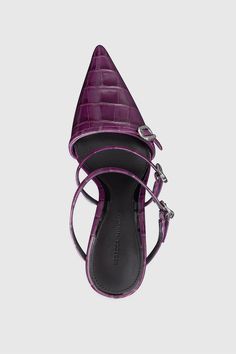 Make a bold statement with the Mule with Buckles. Featuring a high heel and standout buckle details, this mule is crafted from premium leather with a pointed toe. The leather lining and sock provide comfort, ensuring you look and feel your best. Style# BUCKLEMLH94 Leather Crocodile Heel Height: 3. | Rebecca Minkoff Buckle Heeled Mule In Berry - Size 7.5 Pointed Toe Calf Leather Heels With Buckle, Luxury Pointed Toe Mules With Reinforced Heel, Pointed Toe Calf Leather Heels With Buckle Closure, Designer Mules With Pointed Toe And Reinforced Heel, Designer Mules With Reinforced Heel And Pointed Toe, Modern Calf Leather Heels With Buckle Closure, Pointed Toe Calf Leather Slingback Pumps With Buckle Closure, Luxury Pointed Toe Mules For Office, Modern Mules With Buckle Closure And High Heel