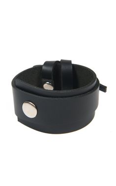 Black Leather Wrist Band - METBR11 Accessories play a huge part in any fashion lover's outfit and with a handmade piece like this one, your style will get a lot of attention! The bracelet is very easy and comfortable to wear, it is light weight and perfect for your daily activities. The best part is it suits many different clothes and other accessories so you don't have to worry about matching it. The bracelet closes with a snap button and its circumference from button to button is about 7 inche Punk Style Leather Cuff Bracelet With Wrist Strap, Adjustable Leather Punk Cuff Bracelet, Adjustable Black Band Punk Cuff Bracelet, Adjustable Punk Cuff Bracelet With Black Band, Adjustable Black Punk Cuff Bracelet, Adjustable Black Cuff Bracelet Punk Style, Leather Punk Cuff Bracelet With Wrist Strap, Black Leather Punk Bracelet With Wrist Strap, Punk Leather Cuff Bracelet With Wrist Strap