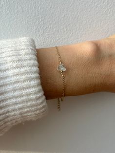 A beautiful crystal is combined with a dainty chain to create this bracelet. Aquamarine is also the birthstone of anyone born in the month of March. D E T A I L S  *It features a raw aquamarine nugget. Each of these is unique and measures between 6 and 8mm. *It has been wire wrapped to a dainty stainless steel chain. This  available in 14k gold, silver and rose gold. *Stainless steel does not tarnish or oxidise and is also amazingly hypoallergenic. *Bracelet comes with a matching crystal card and as with all our products is ready for gifting. S I Z I N G * H E L P *Choose the length from the drop down menu. Use the length guide as a reference. Bracelet comes with an  extender chain which will allows room for adjustment as a snug fit works best to avoid it rolling around as the nugget is qu The Nugget, Nugget Bracelet, Raw Aquamarine, Aquamarine Bracelet, Star Chain, Aquamarine Crystal, Dainty Chain, Rose Gold Chain, March Birthstone