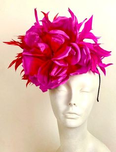 "Red and Fuchsia Fascinator-Wedding- Hot pink Headpiece- Cocktail Hat- Polo match  Hello,          One of a kind- ships in 1 business day. This red and magenta feather fascinator is about 11\" round.  Silk flower is about 8\" wide. It is attached to a black satin adjustable headband that is wrapped in satin and is very comfortable.  On a black straw base.   -------------------------------------------------- I ship US Postal Service.           USA DOMESTIC CHOICES (From mailed date in business days) First Class:  Arrives 3-6 days. (No insurance) Priority:        Arrives 1-4 days.  (Insurance included)                   Express:       Arrives 1-2 days.  (Insurance included)      INTERNATIONAL CHOICES (From mailed date in business days) First Class:  Arrives 10-26 days. Priority:        Arriv Pink Headpiece, Orange Fascinators, Red Fascinator, Fascinator Wedding, Pink Fascinator, Feather Fascinator, Polo Match, Head Pieces, Wedding Fascinators