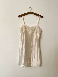 Vintage Slip Nightgown, Cream Satin Sleepwear For Summer, Cream Sleepwear For Wedding Night In Summer, Feminine Cream Nightgown With Lace Trim, Cream Elegant Sleep Dress, Vintage Camisole Slip Dress For Wedding, Vintage Slip Dress For Wedding Night, Elegant Cream Night Dress, Elegant Cream Dress For Night