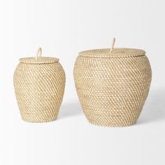 two woven baskets sitting next to each other