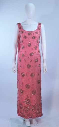 For Sale on 1stDibs - This Maxwell Shieff gown is composed of a pink embellished silk, with rhinestone and bead applique. There is a center back zipper and drape. In excellent Glamorous Pink Silk Gown, Pink Embellished Silk Evening Dress, Pink Embellished Evening Dress, Silk Prom Gown With Sequins, Pink Evening Gown For Festive Occasions, Pink Embellished Gown For Evening, Pink Embellished Gown For Formal Occasions, Festive Pink Sequined Evening Dress, Festive Pink Evening Dress For Gala