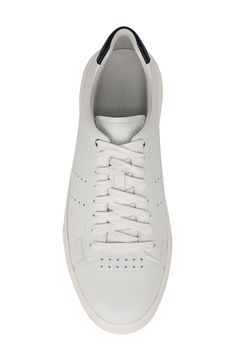 A low-top sneaker is textured with perforations and cushioned by a padded collar for all-day comfort. Leather upper/synthetic lining/rubber sole
 Imported Sneaker Men, Suede Sneakers, Low Top, Sleek Design, Nordstrom Rack, Top Sneakers, White Blue, Rubber Sole, Leather Upper