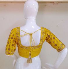 Pure raw silk blouse with maggam work on neck sleeves and back neck. Custom fitted. -Measurements sheet will be sent to you once you order( Standard sizing also available) -Custom colors available -Work on front back and sleeves. Luxury Yellow Unstitched Blouse, Designer Yellow Art Silk Blouse Piece, Designer Yellow Blouse Piece With Cutdana, Designer Yellow Cutdana Blouse Piece, Designer Dola Silk Yellow Blouse, Designer Yellow Dola Silk Blouse, Fitted Yellow Dola Silk Blouse, Festive Yellow Art Silk Blouse, Yellow Unstitched Art Silk Blouse