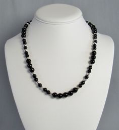 Highly polished black onyx that will add sleek sophistication to your everyday style. This natural stone and sterling silver necklace has 6mm and 8mm black gemstone beads with 4mm and 5mm sterling silver beads. It has a sterling spring ring clasp and is available in two lengths. Choose 16 inch or 20 inch -- or maybe you should get both to create a layered statement. This necklace and all KBeadsIt jewelry ships free with USPS first class domestic package service. The bracelet and earrings are sol Necklace Elegant, Buy Bead, Natural Stone Jewelry, Black Polish, Everyday Necklace, Swarovski Crystal Earrings, Onyx Bead, Sterling Silver Bead, Elegant Gift