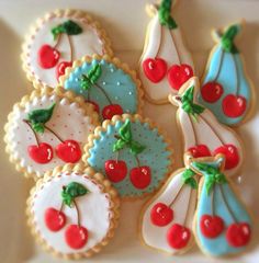 decorated cookies with cherries and cherries on them