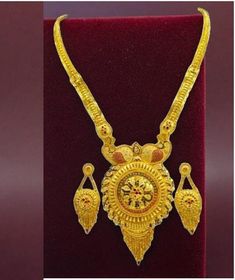 Elevate your style with this exquisite 22K gold plated traditional necklace set, perfect for special functions, weddings, or festive occasions. Designed with intricate craftsmanship, this necklace set reflects the beauty of Indian bridal jewelry. The vibrant golden hues and detailed motifs make it an ideal choice for a regal look. This set includes matching earrings to complete your ensemble, making you stand out in any celebration. The lightweight design ensures comfort without compromising ele Yellow Gold Chandbali Temple Necklace As Gift, Round 22k Gold Temple Necklace As Gift, 22k Yellow Gold Jewelry Sets For Puja, Yellow Gold Jewelry Sets For Puja And Festivals, Gold Jewelry With Meenakari For Puja, Gold Chandbali Jewelry For Puja, Gold Chandbali For Puja, Gold Jewelry With Intricate Design For Puja, Gold Plated Jewelry With Intricate Design For Puja