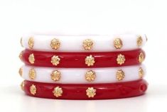 Material:- Plastic These Beautiful Gold Platted Bangles Set Best for gifting and personal use, You can gift your Girlfriend, Mother, Sister , Relatives , Neighbours etc. Combine it with Matching Dress and be the Limelight of every Occasion ( Diwali, Birthday, Anniversary, Christmas, Any Ritual Festival). Suitable for all Occasions. a)These are very skin Friendly. b)The plating is Non- Allergic and safe for all Environment. Gift for Her, Best Friend Gift, Gift Ideas, Valentines Day Gift,Teacher a Red Bracelets For Puja, Red Bohemian Bangle For Festive Season, Traditional Flower Shaped Bracelets, Festive Red Bohemian Bangle, Handmade White Bangle For Festive Occasions, White Handmade Bangle For Festive Occasions, Traditional Pink Bracelets For Gifts, Traditional Pink Bracelets As Gift, Red Bohemian Bangle For Festive Occasions