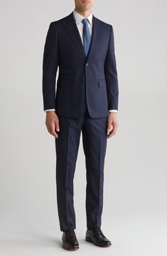 Sophisticated peaked lapels smarten the jacket of this trim-fit suit paired with flat-front trousers and finished in a handsome windowpane plaid print. 36 1/4" inseam; 7 3/4" leg opening; 10 1/2" rise (size 38R) Jacket has peaked lapels; chest welt pocket; front flap pockets Unhemmed Lined 80% polyester, 18% rayon, 2% spandex Dry clean Imported Male Wedding Guest Outfit Formal, Male Wedding Guest, Navy Suit Tie, Wedding Guest Outfit Formal, Male Wedding Guest Outfit, Male Wedding, Windowpane Plaid, Suits Men, Trim Fit