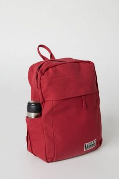 Looking for a sustainably and ethically made backpack for college, work, travel, hiking or other outdoor activities? Our spacious and durable Earth Backpack is the workhorse of our line, built for everyday carry with heavy-duty 14-oz. certified organic cotton canvas that is made in a Fair Trade Certified™ Factory. The generous main compartment is divided with a no-fuss sleeve for your laptop and one small interior pocket to keep things organized. Two water bottle sleeves and the large zippered e Backpacks For College, Best Backpacks For College, Eco Backpack, Eco Friendly Backpack, Backpack For College, Sustainable Backpack, Organic Labels, Soap Packing, Everyday Backpack