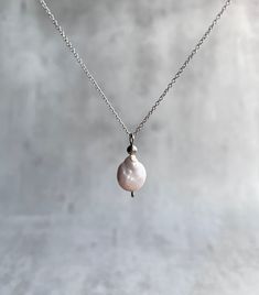 Amazing dainty necklace with baroque pearl pendant. Explore ways to layer this piece or wear it on its own for a minimal look. Dainty, minimal, stylish, lightweight choker. Great gift idea for women (wife, girlfriend, mom, sister...). Please select your necklace size from a drop-down menu from 14' (35 cm) to 24' (60 cm). To get the right necklace size for you: * Take a string or a piece of ribbon etc. * Wrap around your neck to the desired spot for wearing your necklace * Hold or mark that spot Minimalist White Chain Necklace With Pearl Pendant, Minimalist Pearl Charm Choker Necklace, Dainty Charm Necklace With Pearl Chain And Round Pendant, Delicate Baroque Pearl Necklace With Delicate Chain, Silver Minimalist Charm Necklace With Pearl Chain, Minimalist Pearl Chain Choker Necklace, Minimalist Silver Charm Necklace With Pearl Chain, Delicate Baroque Pearl Necklace, Dainty Pearl Pendant Necklace With Delicate Chain