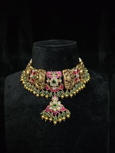 Why Choose Us: 1. 925 sterling silver kundan Choker jewelry 2. Silver Nakshi kundan Choker With Earrings 3. Used pearls with moissanite Kundan stones. 4. 22kt Goldplated Earrings 5. Used Good Kundan quality stone in. 6. Fast word wide shipping with easy tracking. Returns not accepted, unless the product has a manufacturing defect or damaged during courier. Thank You For Visiting our Page. Contact Us For Any Query On Our Contact No. Brand : Jewelsacrafts Material: 925 Silver Country Of origin: India Stone : Kundan Stones Ceremonial 22k Gold Meenakari Jewelry, 22k Gold Hallmarked Jewelry For Diwali, Hallmarked Kundan Chandbali Temple Necklace, 22k Gold Meenakari Jewelry For Ceremonial Occasions, Heavy 22k Gold Pendant Jewelry, Hallmarked 22k Gold Jewelry For Festivals, Kundan Jewelry For Celebration, Kundan Necklace For Anniversary And Festivals, Kundan Necklace With Tilla For Anniversary And Festivals