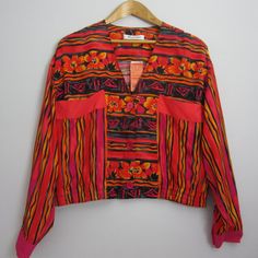 New Vtg Marder 12 Orange Pink Floral Striped Ls Rayon V Neck Shirt Jacket Pockets $84 Nwt Elasticized At Waist Small Center Back Hem Vent Pit To Pit 23" Length 20" Sleeve 21.5" Sku 100 Fall Patchwork Pink Blouse, Vintage Patchwork Blouse For Spring, Pink Long Sleeve Retro Top, Vintage Pink Patchwork Top, Pink Vintage Patchwork Top, Pink Retro Blouse For Fall, Pink Retro Fall Blouse, Vintage Long Sleeve Pink Blouse, Vintage Pink Long Sleeve Blouse