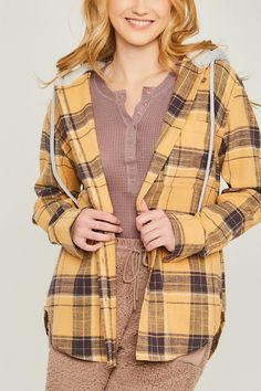 DetailsHooded flannel shirt jacket featuring a soft and cozy hoodie lined with sherpa. Lightweight material with button down front style. Content + Care- 65% Cotton, 35% Polyester Size + Fit Measurements taken from size Small.- Full length: 27.5"- Bust: 19"- Sleeves: 20" Casual Hooded Shacket For Fall, Cozy Flannel Outerwear For Winter, Cozy Flannel Winter Outerwear, Plaid Cotton Hooded Jacket For Fall, Cotton Shacket For Fall And Cold Weather, Plaid Hooded Flannel Outerwear, Cozy Flannel Outerwear With Long Sleeves, Cozy Long Sleeve Flannel Outerwear, Hooded Flannel Outerwear For Fall