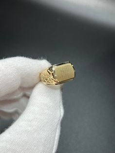 This is our unique nugget signet ring with a sleek matte finish.  - Made with solid 10KT gold  - Stamped "10KT" for authenticity - Made to order in any finger size, please allow 1-2 weeks for production Wear with love and care <3 ------------------------------------ SHIPPING POLICY - Items in stock ship typically within 1-3 business days.  - Certain items ordered in specific sizes/lengths (such as most of our rings) are made to order and require 5-10 business days to manufacture and ship thereaf Yellow Gold Nugget Signet Ring Gift, Classic Gold Nugget Ring, Yellow Gold Nugget Signet Ring, Classic Yellow Gold Nugget Ring, Classic Hallmarked Nugget Jewelry, Gold Nugget Signet Ring Stamped 14k, Formal Nugget Shaped Signet Ring With Polished Finish, 14k Gold Nugget Signet Ring For Anniversary, Formal 14k Gold Nugget Signet Ring