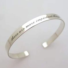 Personalized Sterling silver bracelet for her, Valentines gift, Birthday gift for her, mothers day gift etc..  Custom skinny cuff Bracelet in Sterling Silver for women. Engraved quote cuff bracelet for women. Elegant and delicate jewelry piece, fine silver bangle bracelet.  A gift to melt one's heart, Personalized cuff bracelet. Order the romantic piece to complement your collection or to make an unforgettable gift.  You may be sure, such a gift will make a day! The silver bangle bracelet is polished to a shiny finish.  Together with your idea and my work it will become an inspirational quote band!  You order what to engrave, I make the engraving carefully with the romantic script font!  The bangle cuff can be two sides engraved as well. So you may order a secret message! This piece makes Adjustable Bangle Cuff Bracelet For Anniversary, Nickel Free Bangle Name Bracelet For Gift, Nickel Free Bangle Name Bracelet Gift, Elegant Stamped Bangle As Gift, Nickel Free Silver Cuff Bracelet For Anniversary, Stainless Steel Cuff Bracelet Bangle For Wedding, Silver Round Bracelets Suitable For Gifts, Silver Round Bracelet, Elegant Stamped Bangle Perfect For Gifts