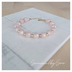 Beaded Pink Gemstone bracelet/ // DESCRIPTION \\ \These lovely pink bracelet is perfect for attracting attention without standing out. These are good to add point on casual outfit. They are also great with wedding ceremony and anniversary gift./ // MEASUREMENTS \\ \Total Length: 21cm (included chain 4cm) / ~8.5 inchesStone size: Pink 10mm                    Gold 0.3mm♥♥♥Please CHECK THE SIZE before ordering. Thank you.♥♥♥/ //SIMILAR and MATCHING ITEMS\\ \https://www.etsy.com/listing/958637889/pi Pink Gemstone Bracelet, Swarovski Pearl Necklace, Patriotic Earrings, Romantic Earrings, Pink Gem, Holiday Earring, Pink Gemstones, Pearl Choker, Swarovski Pearls