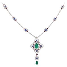 Cast from 18-karat gold, this exquisite necklace is hand set with 6.57 carats Emerald, Blue sapphire and 4.17 carats of sparkling diamonds. FOLLOW MEGHNA JEWELS storefront to view the latest collection & exclusive pieces. Meghna Jewels is proudly rated as a Top Seller on 1stDibs with 5 star customer reviews. All items manufactured by us are handmade and can be customized or redesigned. Certificate of authenticity available upon request. Composition Gross Weight: 23.54 Grams Gold Net Weight: 21.40 Grams Diamond Weight:- 4.17 Carats Diamond Quality: FG--SI Emerald & Blue Sapphire Weight:- 6.57 Carat Necklace Length: 16 Inches Luxury Sapphire Necklace Hallmarked, Exquisite Diamond Multi-stone Necklaces, Blue Diamond Necklace For Formal Occasions, Luxury Blue Diamond Necklace For Formal Occasions, Exquisite Multi-stone Necklace For Formal Occasions, Luxury Blue Diamond Pendant Necklace, Luxury Sapphire Necklace With Brilliant Cut, Elegant Sapphire Necklace With Hand-set Details, Elegant Sapphire Necklace With Hand Set Details