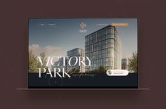 the website for victory park express is displayed on a laptop screen with an image of a building in the background