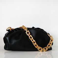 We can't get enough of our chain bag with featuring a chunky gold chain ✨ Genuine Leather + Metal Chain 31 x 12 x 16 CM Please note: the maximum number of letters that can be monogrammed is 10. Chunky Gold Chain, Cloud Bag, Handbags Designer, Handbags Casual, Vegan Leather Bag, Phone Purse, Black Chain, Big Fashion, Casual Tote