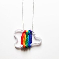 Rainbow Cloud cotton statement necklace I designed this rainbow cloud Necklace. Rainbow Necklace that will make happy and cheerful.  All my jewellery is made with organic cotton which could be great as gifts. Buy this necklace as a gift for mum or as unique gifts for friends. A combination of statement and minimalist styles. Instantly dress up any outfit by adding this striking piece of statement jewelry. Easy to wear and combine with any casual or elegant outfit. Comfortable necklace made from Adjustable Round Rainbow Necklaces, Rainbow Multi-strand Necklace As Gift, Adjustable Rainbow Hand-strung Necklaces, Heart-shaped Rainbow Necklace For Gift, Cheap Rainbow Statement Necklace, Cotton Cord Necklace, Lily Necklace, Cotton Cord, Cotton Necklace