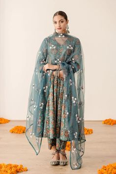 Introducing this exquisite Pure Cotton Green Floral Printed Anarkali Suit Set - the perfect choice for creating a sublimely stylish look. Expertly crafted from cotton, its delightful floral print sets it apart as a truly luxurious piece for summer evenings and garden parties. Comfortably flattering, it makes a timelessly tasteful style statement. No. of set : 3 pieces Color : Green multicolor Fabric : Pure Cotton Kurta Length : 40 inches Pant Length : 38 inches Washing Instructions : Dry Clean Transitional Anarkali Palazzo Set With Floral Embroidery, Festive Anarkali Palazzo Set With Floral Embroidery, Transitional Wedding Palazzo Set With Printed Motifs, Diwali Cotton Silk Kurta With Floral Print, Anarkali Palazzo Set With Floral Print And Traditional Drape, Diwali Cotton Silk Floral Print Kurta, Eid Cotton Silk Traditional Wear With Floral Print, Diwali Floral Cotton Silk Kurta, Traditional Unstitched Floral Print Sharara