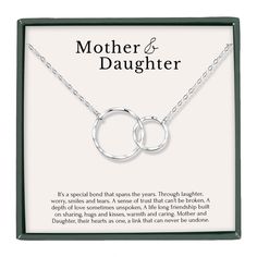 PRICES MAY VARY. MOTHER DAUGHTER BOND: Celebrating the unbreakable bond between a mother and her daughter and make every moment memorable with this heartfelt symbol of love and affection. Our interlocking circles symbolize eternal connection and enduring love. Whether it's to mark a new milestone in motherhood, a gift from daughter to mom, a gift from mom to daughter, a gift to a mom friend -- this necklace is the right choice! GIFT FOR ALL OCCASIONS: Honor the special woman in your life! Our ci Double Circle Necklace, Mother Daughter Bonding, Mother Daughter Jewelry, Interlocking Circle Necklace, Circles Necklace, Birthday Presents For Mom, Mom Friend, Touch Love, Mother Daughter Necklace