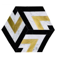 two black and white marble hexagonals with gold accents on each one side