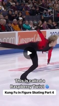 a woman skating on an ice rink in front of a crowd