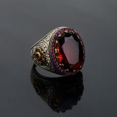 We designed this unique red zircon stone design for you and produced it carefully. This ring will be an unforgettable, stylish and useful gift to your loved ones. We package the ring in a way that is suitable for gifting. -Item Details - Gender : Male / Female - Materials: 925K Sterling Silver - weight: 12-18 gr * Ready to Ship in 1-3 Business Days * The product is sent with a suitable box for gifting. *visit our store for unique unique jewelry and the most advantageous prices Please feel free t Luxury Red Jewelry With Gemstone Accents, Luxury Ruby Rings With Gemstone Accents, Red Cubic Zirconia Gemstone Ring, Luxury Rings With Gemstone Accents For Gift, Red Rings With Accent Stones For Gift, Red Stone Setting Ring Gift, Red Stone Setting Ring As Gift, Garnet Stone Setting Jewelry Gift, Red Stone Setting Ring For Gift