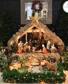 a nativity scene with lights and decorations