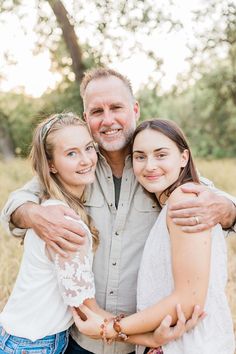 Father And 2 Daughters Photography, Senior Family Photos, Father And Daughters Photo Ideas, Family Photos With 2 Daughters, Family Photos 2 Daughters, Dad And Older Daughter Photo Ideas, Parents And Daughter Photography, Mom With Adult Children Poses, Father And Daughter Photo Ideas