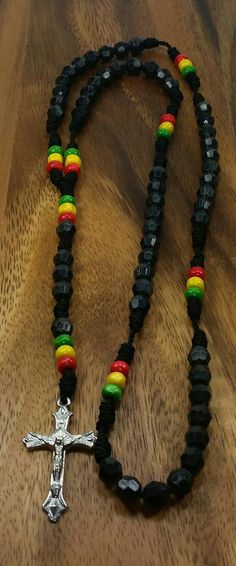 "Rasta Rosary Necklace Color: Black 20\" Inches Long Unisex Rosary FAST SHIPPING! Visit my Etsy Shop to see more Rasta Style Jewelry and Beanies! At Freedom Life Style Jewelry you will find a variety of Rasta Necklaces, Rasta Earrings and Rasta Bracelets. Click here to see more designs: https://www.etsy.com/shop/FreedomLifeStyle" Rasta Necklace, Black Rosary Necklace, Rasta Flag, Black Rosary, Rasta Earrings, Knotted Rosary, Eye Of Horus Necklace, Africa Earrings, Black Drop Earrings