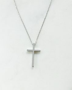 "Silver cross necklace, cross necklace, religious necklace cross, religious gift, simple cross necklace, silver necklace, religious gifts women Simple and elegant shiny silver plated cross necklace. D E T A I L S: * Silver plated cross pendant charm 13mm x 23mm * Silver plated chain *Lobster clasp closure *Shown at 18\" length SHIPPING: *Free domestic shipping on all orders PACKAGING: *All pieces come beautifully packaged, perfect for gift giving. Find more to ❤️ here: http://etsy.com/shop/theje Minimalist Daily Wear Cross Pendant Necklace, Minimalist Everyday Cross Necklace, Everyday Minimalist Cross Pendant Necklace, Minimalist Cross Pendant Necklace For Everyday, Minimalist Cross Necklace For Everyday, Minimalist Cross Pendant Necklace For Everyday Wear, Everyday Silver Cross Pendant Necklace, Minimalist Silver Cross Necklace, Simple Everyday Cross Necklace