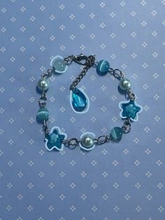 metal bracelet with blue beads star and round shape beads handmade by me :) Cheap Blue Beaded Chain Bracelets, Napa Ca, Metal Bracelet, Beads Handmade, Blue Bracelet, Metal Bracelets, Blue Beads, Chain Link Bracelet, Beaded Chain