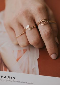 An updated version of our cuff ring. This time we made the ends pass by one another. Inspired by the definition of sonder: the realization that each random passerby is living a life as vivid and complex as your own. 14g wire is hand-shaped and hammered for texture. Available in 14kt Gold Fill + Sterling Silver. Shown with our Confetti Rings and Raye Ring. Handmade in Eau Claire, WI All of our jewelry is handmade to order so each piece will be unique and may vary slightly from what is pictured. Confetti Rings, Poppy Ring, Copper Uses, Everyday Wear Jewelry, Cuff Ring, Cuff Rings, Circle Studs, Herkimer Diamond, Freshwater Pearl Necklaces