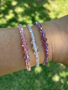 This hand-made beautiful bracelet really shines with the Preciosa crystals.  Makes an excellent gift for any occasion.  Made with 28 small beads and 3 large beads.  You can choose from various colors of beads and strings.  It is very comfortable to wear and is adjustable. Adjustable Bracelet With Faceted Beads, Faceted Bead Crystal Bracelet Gift, Pink Crystal Beaded Bracelets With Faceted Beads, Pink Crystal Beaded Bracelet With Faceted Beads, Adjustable Faceted Crystal Beads, Crystal Bracelet With 8mm Beads As Gift, Crystal Beaded Bracelets With Faceted Beads, Adjustable Crystal Beaded Bracelets With Faceted Beads, Adjustable Crystal Bracelet With 8mm Beads