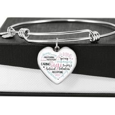 Gigi heart bangle bracelet with option engraving. The perfect gift for Gigi on Mothers Day, Christmas, Birthdays, or just because. Purchase This Best-seller and We Guarantee It Will Exceed Your Highest Expectations! This Jewelry Item Is the Perfect Keepsake! Whether for Yourself or a Loved One. ➜ If the custom engraving option is available, engrave onto the back of the pendant your loved one's name, your wedding date, an anniversary, or anything else you want to remember and keep you close to he Silver Heart Bracelet For Best Friend On Mother's Day, Meaningful Heart Bracelets For Mother's Day, Meaningful Heart-shaped Bracelets For Mother's Day, Mother's Day Heart-shaped Meaningful Bracelets, Personalized Heart Bracelet For Friendship, Heart-shaped Silver Bracelets For Best Friend Gift, Silver Heart Bracelets For Best Friend Gift, Engraved Meaningful Bracelets For Valentine's Day, Inspirational Heart-shaped Jewelry For Best Friend