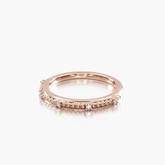 14K Rose Gold Beaded Diamond Ring. Charming and feminine are the perfect words to describe this dainty diamond ring. Glittering diamonds adorn this captivating beaded band. Dainty Eternity Band With Diamond Accents, Rose Gold Diamond Band In Fine Jewelry Style, Rose Gold Diamond Round Cut Bands, Dainty Diamond Stackable Rings In Rose Gold, Dainty Rose Gold Diamond Stackable Rings, Dainty Eternity Band With Single Cut Diamonds, Dainty Rose Gold Diamond Ring, Delicate 14k Rose Gold Stackable Rings, Delicate Rings With Diamond Accents In Round Band