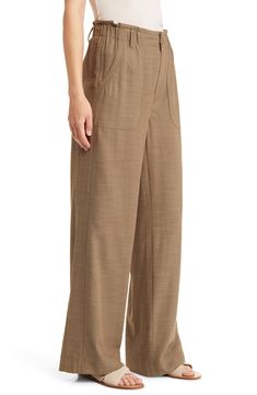 These breezy cotton-kissed pants are crafted with an elastic-back waist and easy wide legs. 30" inseam; 25" leg opening; 12 3/4" front rise; 17" back rise (size 8) 62% rayon, 38% cotton Machine wash, line dry Imported Wide-leg Pants With Elastic Waistband For Daywear, Relaxed Fit Wide Leg Pants With Pull-on Style, Chic Wide Leg Cotton Pants With Elastic Waistband, Chic Cotton Wide Leg Pants With Elastic Waistband, Effortless Cotton Pants With Pockets, Relaxed Wide Leg Pants With Elastic Waistband For Work, Cotton Pants With Pockets, Relaxed Fit Wide Leg Pants With Welt Pockets, Summer Loungewear Bottoms With Patch Pockets